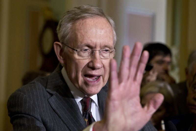 Senate Majority Leader Harry Reid, D-Nev., arrives to speak with reporters following a Democratic strategy session at the Capitol in Washington, Tuesday, April 9, 2013. Reid said he plans showdown vote on gun control on Thursday . (AP Photo/J. Scott Applewhite)