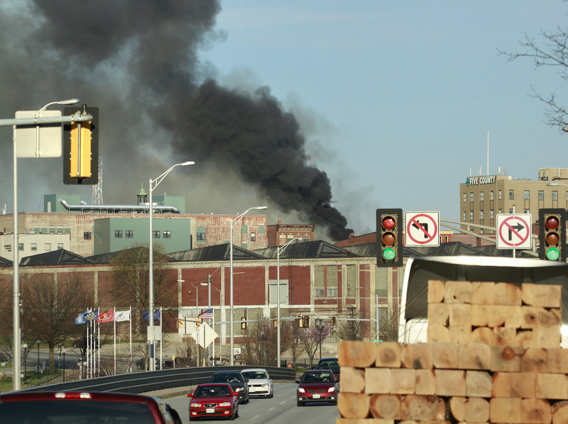 Smoke pours into the Lewiston skyline Monday. The Red Cross was on hand to assist people who lost their homes.