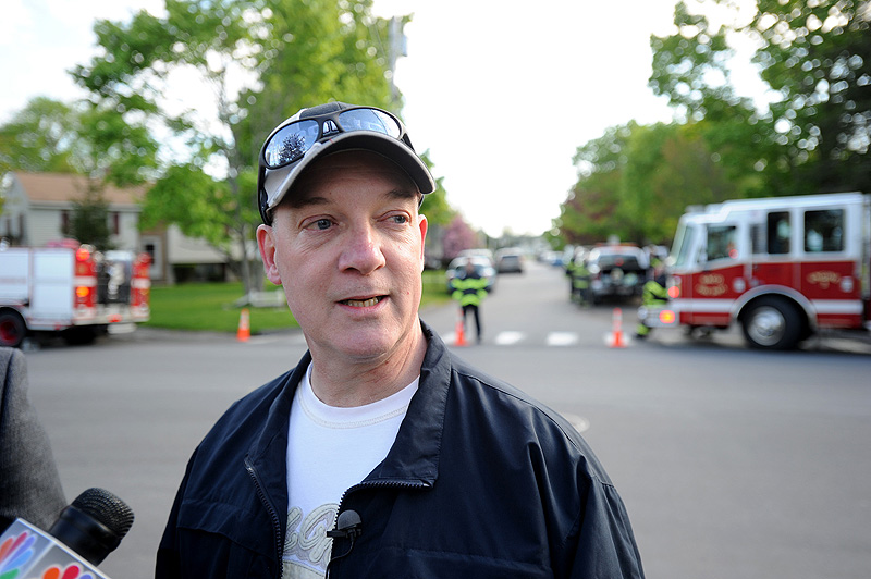 Saco Deputy Police Chief Jeffrey Holland gives a update as state and local police converge on Hillview Avenue in Saco on Saturday during a standoff. standoff