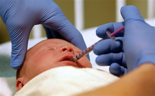 Baby Liam receives a dose of morphine at East Tennessee Children's Hospital in Knoxville, Tenn., on March 29. The baby is one of many infants born dependent on drugs being treated at the facility. In most cases seen at the hospital, mothers had abused prescription painkillers or anti-anxiety medicines while pregnant. East Tennessee Children's Hospital