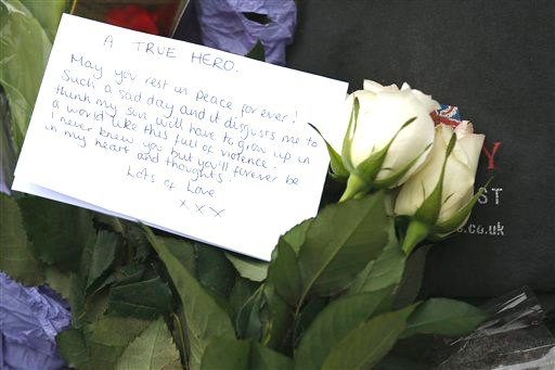 A floral tribute in memory of the victim is seen on Thursday outside the Royal Artillery Barracks near the scene of a terror attack in Woolwich, southeast London.