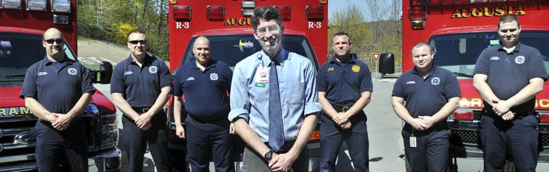 Emergency medical services director Dr. Timothy Pieh, with Augusta Fire Department paramedics that he oversees, on Sunday at Hartford Fire Station.