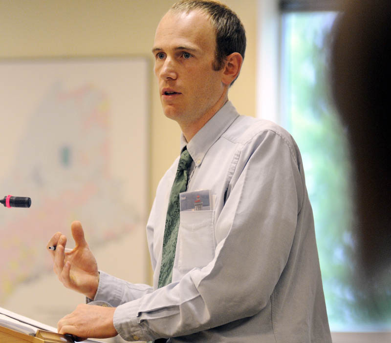 Carrabec High School math teacher Marc Collard discusses a proposal to evaluate teachers Tuesday May 21, 2013 during a Legislative hearing at the Education and Cultural Affairs Committee.