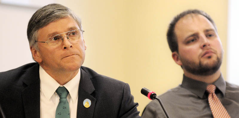 EVALUATE: Sen. Chris Johnson, D-Somerville, left, and Rep. Matthew G. Pouliot, R-Augusta, listen to proponents of legislation to evaluate teachers Tuesday May 21, 2013 during a hearing before the Education and Cultural Affairs Committee.