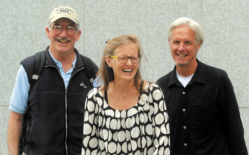 Bill Basford, 67, of Benton, left, Gina Colombatto, 57, of Waterville, center, and Matthew Archibald, 56,of Waterville, have traded in their automobiles for walking shoes.