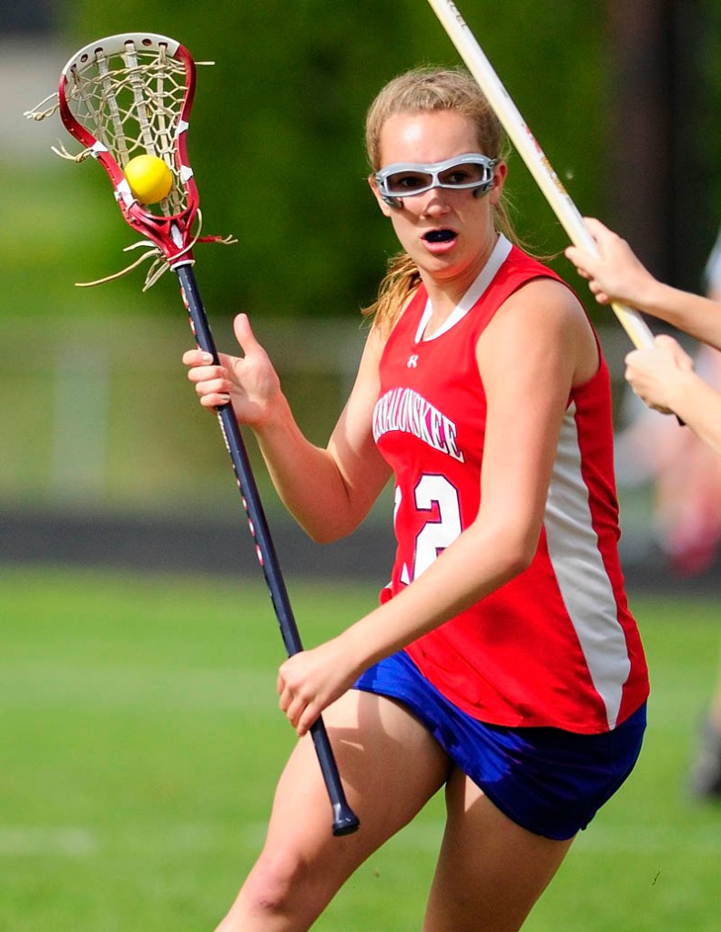 MAKE WAY: Messalonskee’s Kristen Kern, tries to get past Gardiner defenders Thursday at Hoch Field in Gardiner.