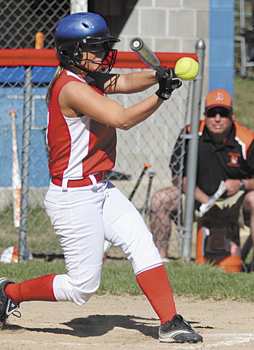 SEE THE BALL, HIT THE BALL: Messalon-skee High School’s Emily York hits a pitch off Brewer High School pitcher Alexa Grindle during Friday’s game in Oakland.