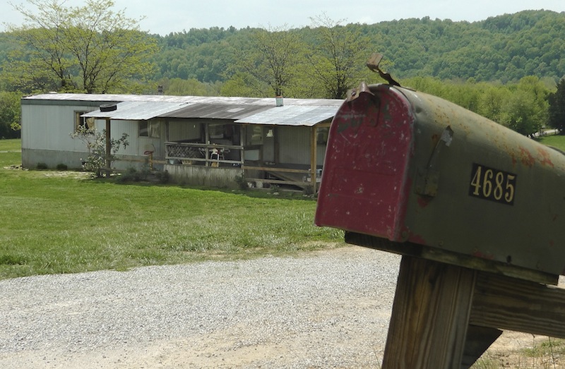 A home in Cumberland County, Ky, is seen on May 1, 2013, where a 2-year-old girl was shot by her 5-year-old brother with a gun designed for children. Investigators say the Tuesday shooting was accidental. The children's mother was home at the time of the shooting Tuesday afternoon but had stepped out to the front porch for a few minutes and "she heard the gun go off," Cumberland County Coroner Gary White said. He said the rifle was kept in a corner and the family didn't realize a bullet was left inside it. (AP Photo/Dylan Lovan)