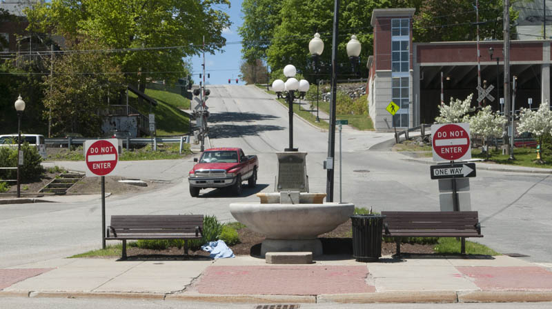 This photo taken on Friday shows the historic Baker fountain at the intersection of Winthrop and Water streets. Proposed renovations to Market Square would move the fountain to the area where the current Kennebec Explorer bus stop is located.