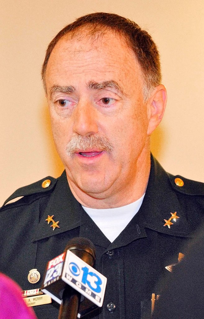 Sagadahoc County Sheriff Joel Merry talks to reporters on Friday at the State House in Augusta. He was there to testify against LD 1229, An Act To Regulate and Tax Marijuana.