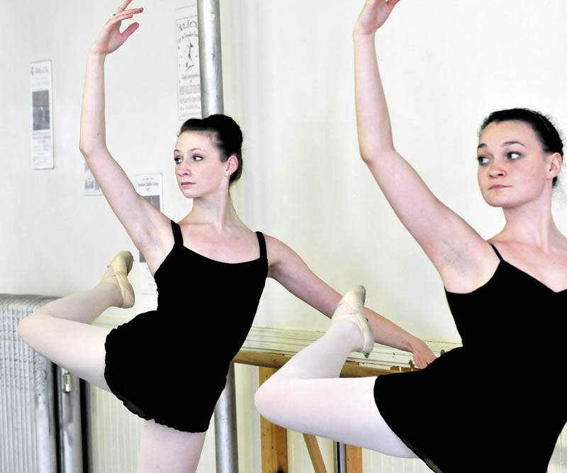Messlaonskee High School student Gabby Perkins, left, and Sarah Costello practice at the Bossov Ballet Theatre at Maine Central Institute in Pittsfield. Perkins has been chosen to attend the Vaganova Ballet Academy in Russia.