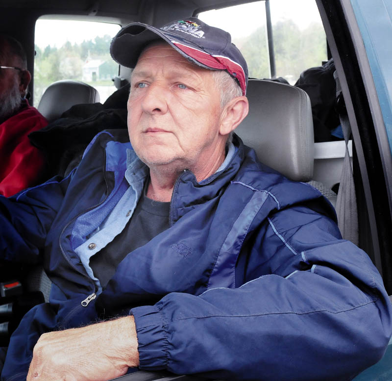 John Spencer Sr., father of missing snowmobiler John Spencer Jr., speaks about the loss of his son and the ongoing effort to retrieve his body from Rangeley Lake on Tuesday.