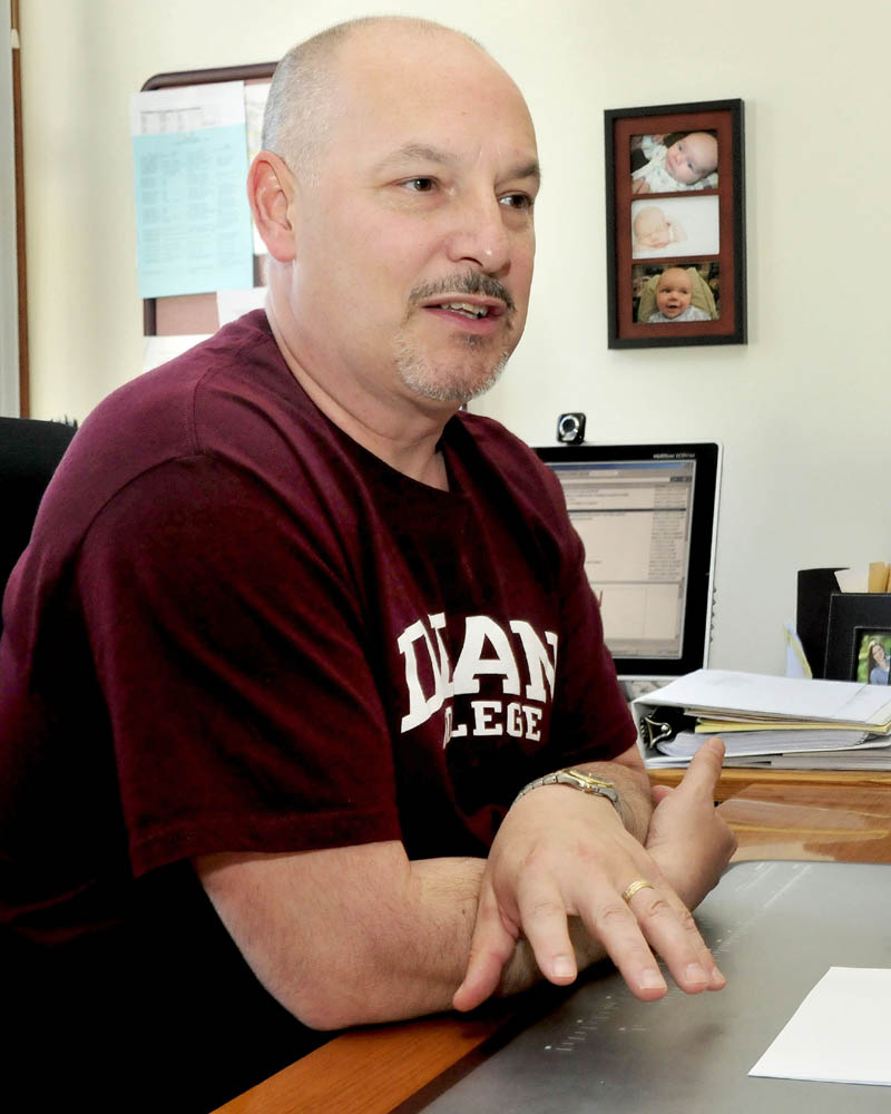 Erskine Academy Headmaster Michael McQuarrie speaks about the State Department od Education giving the independent school a letter grade B on Wednesday.