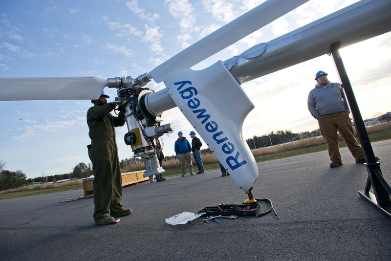 A team from the University of Maine at Orono tests a turbine outside their laboratory in April. The floating turbine will be placed in the ocean off the coast of Castine this month, following Friday's initial placement in the Penobscot River.