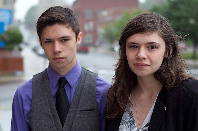 Jonas Maines, left, and his transgender twin sister, Nicole Maines, appear Wednesday outside court in Bangor. Nicole, who was born male but has always considered herself a girl, says the Orono school district discriminated by banning her from the girls' bathroom.