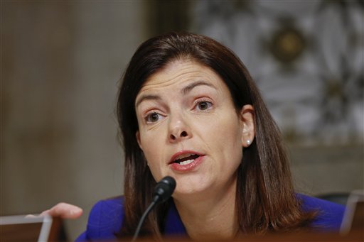 In this Jan. 31 file photo, Senate Armed Services Committee member Sen. Kelly Ayotte, R-N.H., questions President Barack Obama's nominee for Secretary of Defense, Sen. Chuck Hagel, R-Neb., during his Capitol Hill confirmation hearing. Ayotte has taken a sustained political beating on New Hampshire television sets for voting with her Republican Party and against universal background checks on gun purchases. And Republicans close to the first-term senator concede that her popularity has subsequently suffered.