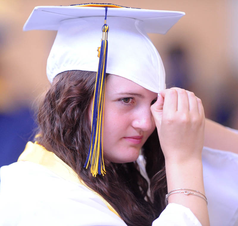 Erika Gray prepares for Mt. Blue High School's commencement ceremonies in Farmington on Saturday.