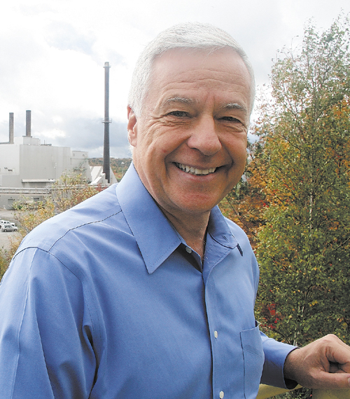 U.S. Representative Mike Michaud stands outside Great Northern Paper mill in East Millinocket in October. Michaud, who represents the sprawling, northern 2nd District, will need to woo southern, 1st District voters if he runs for governor.