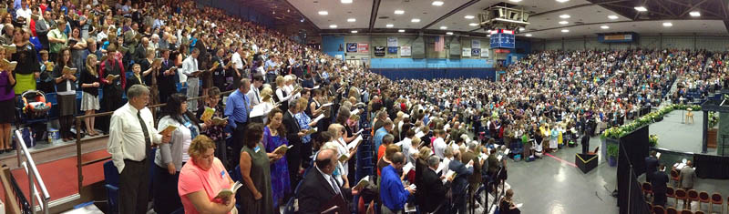 People sing a hymn during a Jehovah's Witnesses district convention on Friday at the Augusta Civic Center.