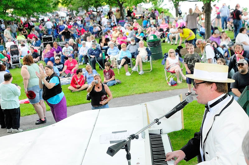Gerald Brann plays and sings with the Yellow Brick Road, an Elton John tribute band, during this year's first Waterfront Wednesday concert on Wednesday in Augusta's Waterfront Park. It was the first of an annual series of shows every Wednesday from 6 p.m. to sunset through August 14. The series is sponsored by radio stations 92Moose and B98.5, Augusta city recreation department and Walgreen's.