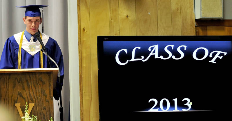 Upper Kennebec Valley Memorial High School Valedictorian Carrington Miller delivers his address to the dozen fellow graduates in Bingham on Sunday.