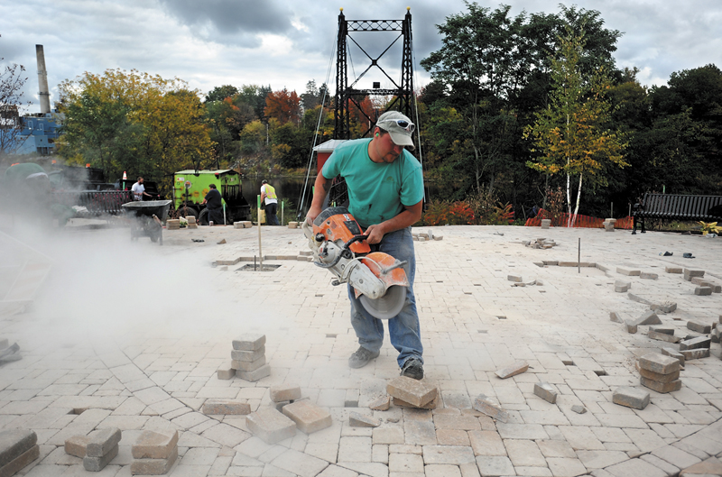 Dave Manning, of Farley and Son Landscaping, helps with the new walkway at Head of Falls in 2010.