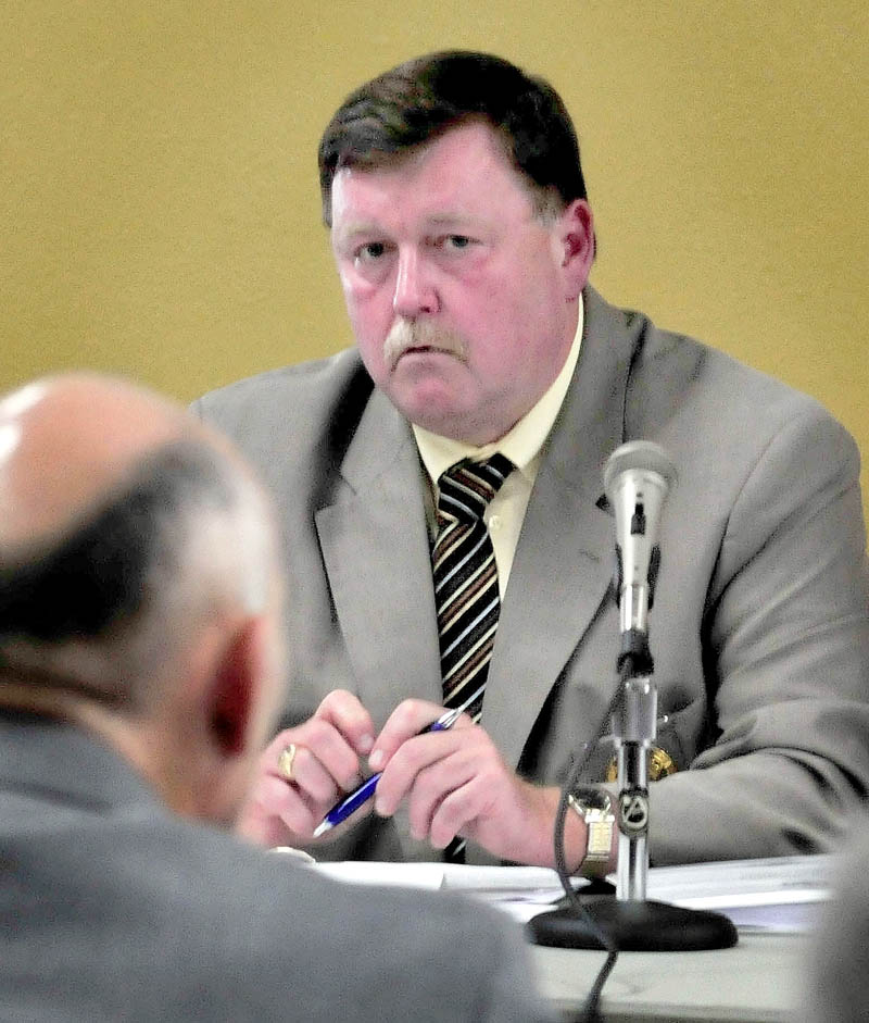 State Board of Corrections Chairman Mark Westrum listens to speakers during a public hearing at the University of Maine in Farmington on Wednesday.