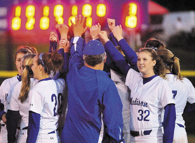 BULLDOGS WIN: Madison celebrates after winning Western Maine Class C softball championship with a 10-3 over Dirigo on Thursday at Richard M. Bailey Field at St. Joseph’s in Standish.