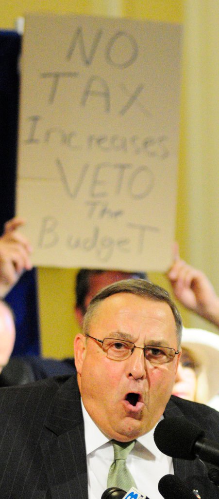 Gov. Paul LePage speaks during a rally on Thursday June 20, 2013 in the Hall of Flags at the State House in Augusta.