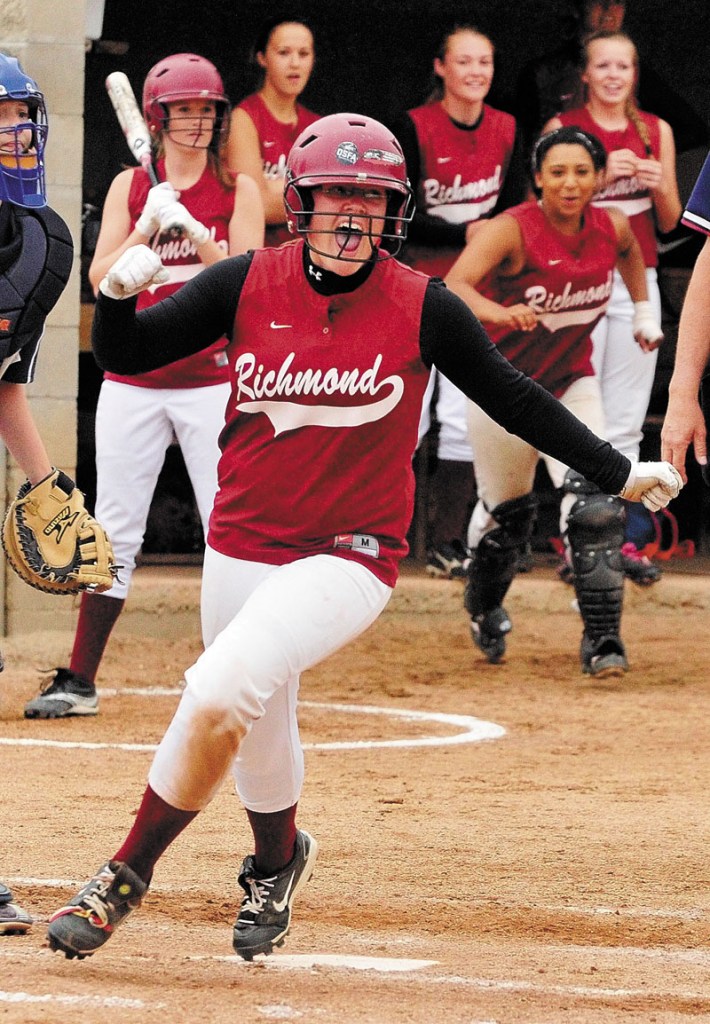 ONE MORE CELEBRATION: Payton Johnson (middle)and the Richmond softball team are one win away from a Class D title.