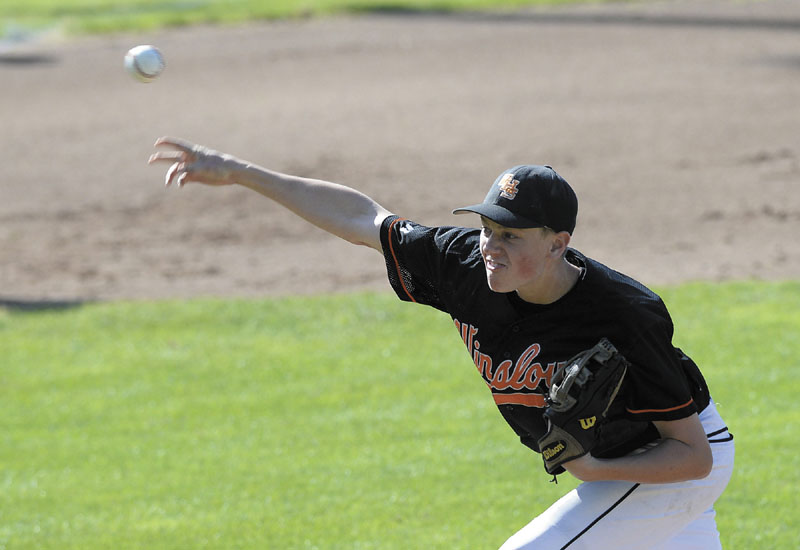 HERE’S THE PITCH: Winslow’s Jacob Trask delivers a pitch during the Black Raiders’ 4-1 loss to York in the Class B state championship game Saturday in Standish.