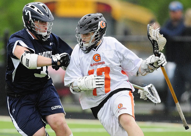 MAKE A RUN: Yarmouth’s Thomas Lord, left, tries to stop Gardiner’s Dalton Sargent during Eastern Maine Class B boys lacrosse regional final Wednesday at Thomas College in Waterville. Yarmouth beat Gardiner 15-3.