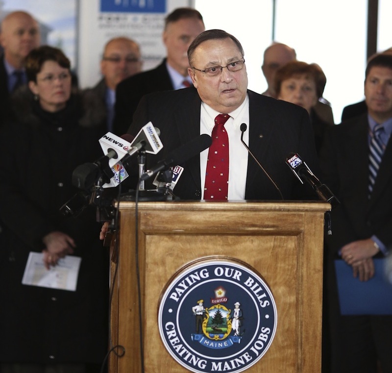 In this January file photo, Gov. Paul LePage holds a press conference at the University of New England's College of Dental Medicine. LePage said Tuesday, July 2, 2013 he's running for re-election.