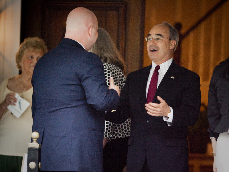 Bruce Poliquin, right, a former candidate for governor, chats with other guests outside the Nonantum Resort in Kennebunkport, where he was attending a fundraiser for Maine Gov. Paul LePage on Tuesday.