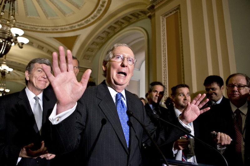 Senate Minority Leader Mitch McConnell, R-Ky., and GOP leaders talk to reporters after the Senate stepped back from the brink of a political meltdown, clearing the way for confirmation of one of President Barack Obama’s long-stalled nominations, at the Capitol in Washington, Tuesday, July 16, 2013. At far left is Sen. Roy Blunt, R-Mo. (AP Photo/J. Scott Applewhite)