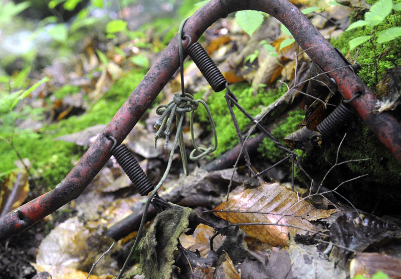 A metal bed frame in a collapsed shelter in Rome that Garrett Hollands discovered in the late 1980s and believed was inhabited by Christopher Knight, a.k.a the North Pond Hermit.