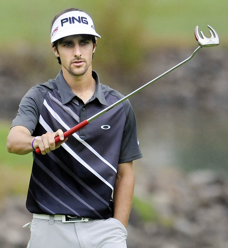 Mack Duke prepares a shot on a green Monday during the first round of the Charlie's Maine Open Championship at the Augusta Country Club in Manchester. Duke shot a 5-under 65.