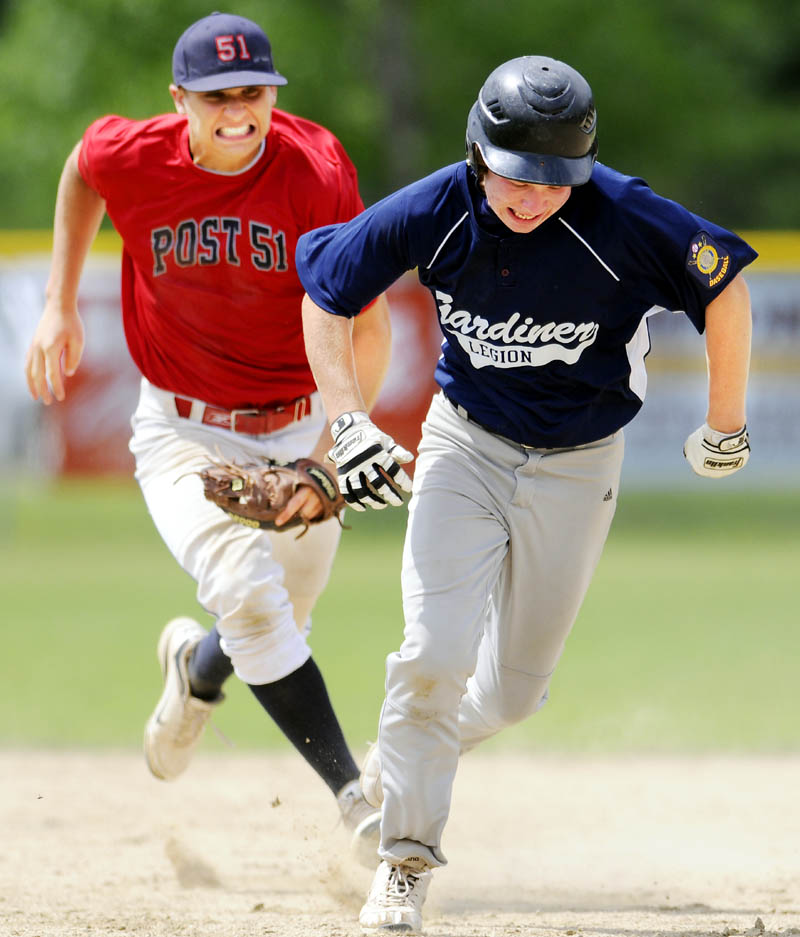 RUN DOWN: Post 51’s Jacob Dexter, left, runs down Gardiner’s Zach Farrin during an American Legion Baseball Zone 2 tournament game Sunday in Augusta.