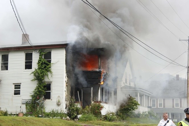 Fire ravages through apartments at 62 Washington St. in Augusta Thursday evening.