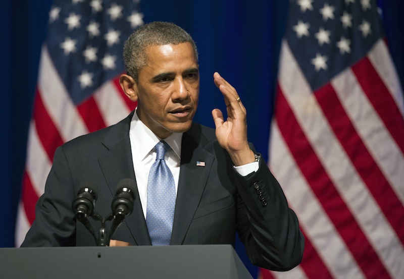 President Barack Obama addresses an Organizing for Action summit in Washington, Monday, July 22, 2013. The president will deliver a series of speeches this week designed to push the economy – and his proposals to ensure its long-term growth – toward the center of the national political debate after months of focus on other issues. (AP Photo/Cliff Owen)