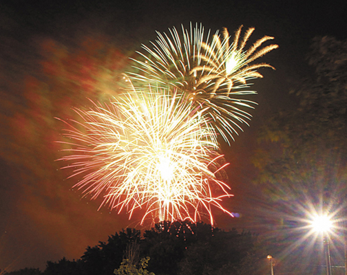 LIGHTING UP THE SKY: Fireworks light up the sky over the Hathaway Creative Center in Waterville. The fireworks show was part of the Winslow Family 4th of July Celebration.