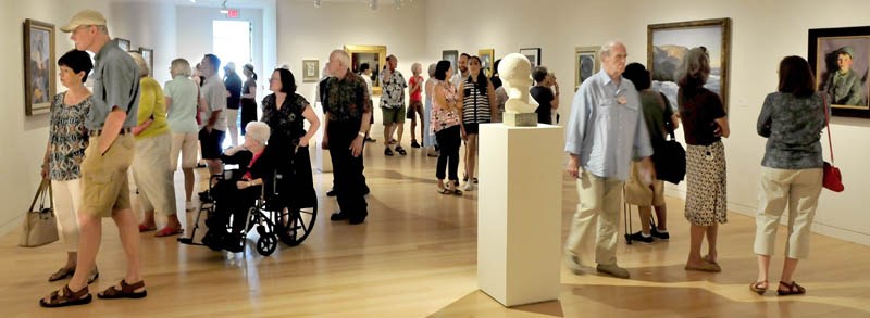 There were more patrons than art pieces in one of the sections of the expanded Colby College Museum of Art in Waterville during Community Day on Sunday.