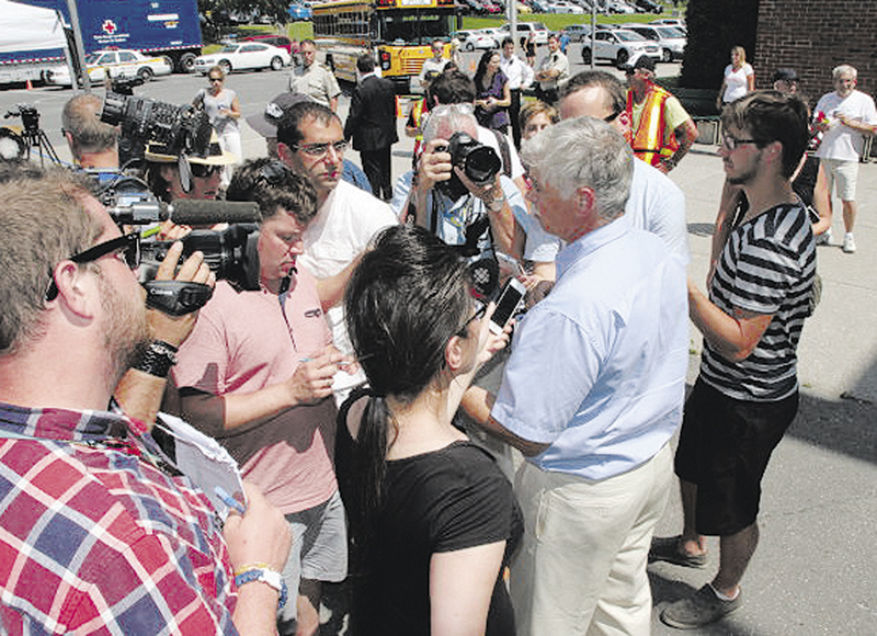 Sen. Tom Saviello at press briefing after meeting with Lac-Megantic town officials.