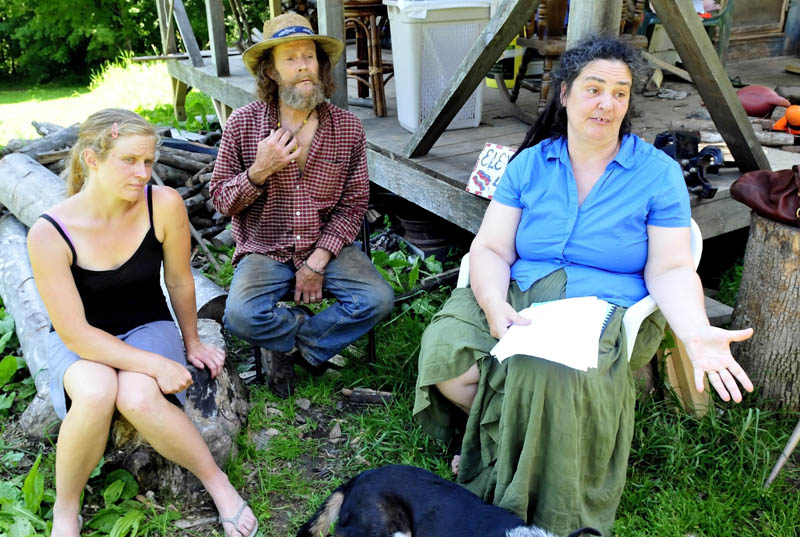 The prospect of a 195-foot cell tower being installed off Abijah Hill Road in Starks has these abutting landowners concerned both for their livelihood and health. Speaking about the situation on Monday are, from left, Elizabeth Smedberg and Harry and Cindy Brown.