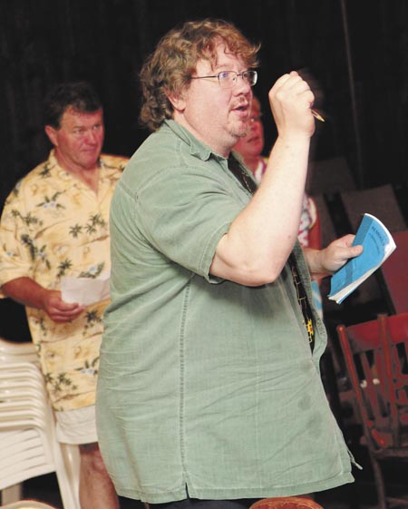 Director Fred Liebfried, of Anson, gives directions recently to actors Kim Hilton and Jimmy Cook during a dress rehearsal for the Sparrow's Nest Community Theater's production of "Almost, Maine."