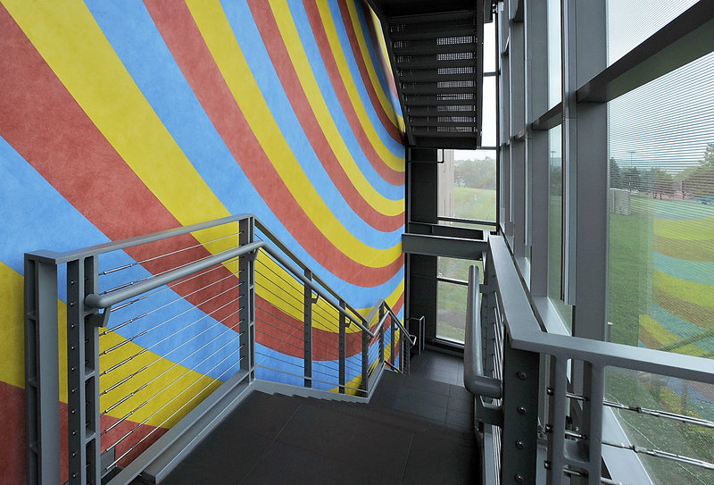 The three-story wall painting, visible outside one of the glass walls of the Alfond-Lunder Family Pavilion at Colby College Museum of Art in Waterville, met with approval from philanthropist Peter Lunder. "They'll know there's a museum there now," the art collector said. "The (Sol) LeWitt (artwork) is drop-dead gorgeous."'
