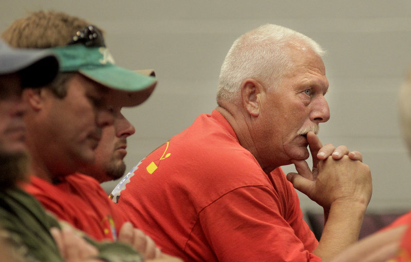 Rocky Alley of Jonesport listens to Marine Resources Commissioner Patrick Keliher during the meeting about the state of the lobster industry. Other meetings will be held in Machias, Ellsworth and Scarborough.