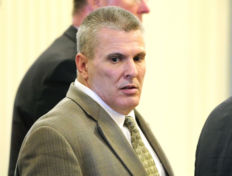 Michael Swenson shows no reaction after he was sentenced in York County Superior Court to 38 years in prison for the stabbing death of Roger White outside an Old Orchard Beach bar on April 20, 2012.