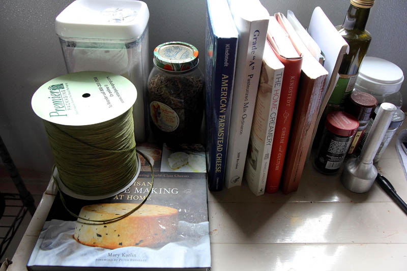 Books on cheese making sit on a shelf at Crooked Face Creamery's in Skowhegan recently.