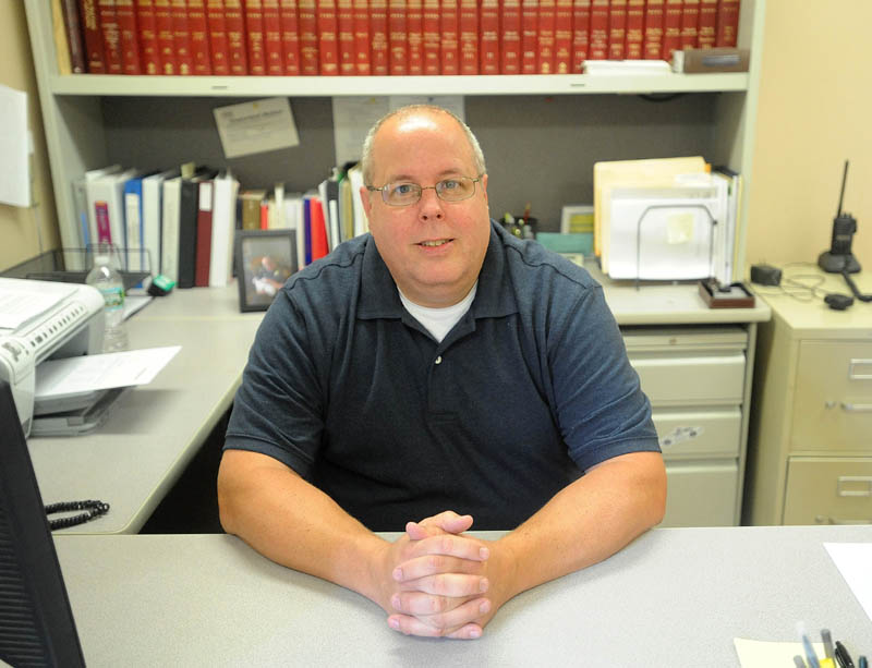 Fairfield Police Chief Thomas Gould, pictured in his office today, recently received a report from the Maine Chiefs of Police Association that gives advice on making the department run more efficiently.